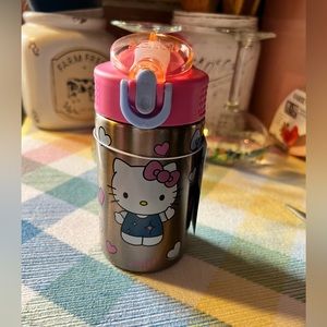 Hello kitty  Small kids size  stainless steel water bottle. With flip top straw
